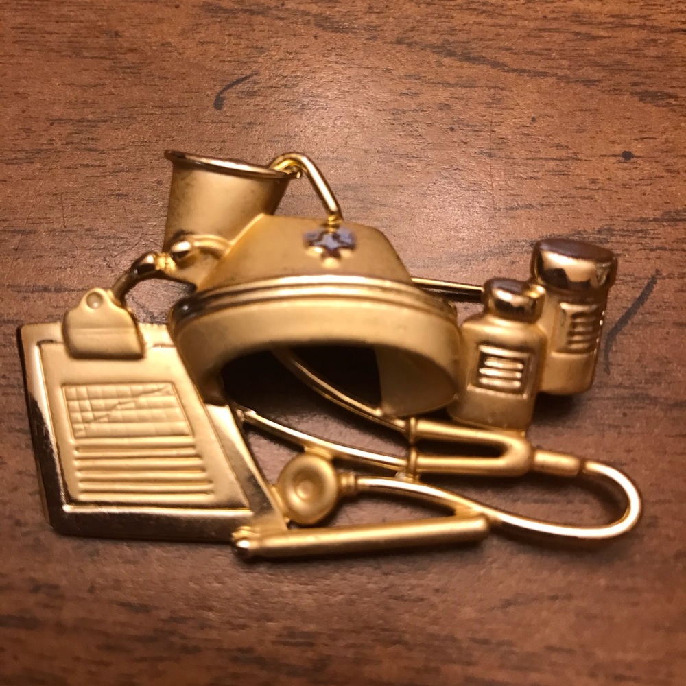 Gold nurse pin